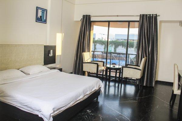 Hotel Aristro Lonavala Pokoj fotografie